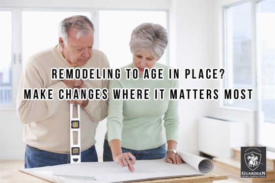 old-couple-looking-at-blue-print-Remodeling